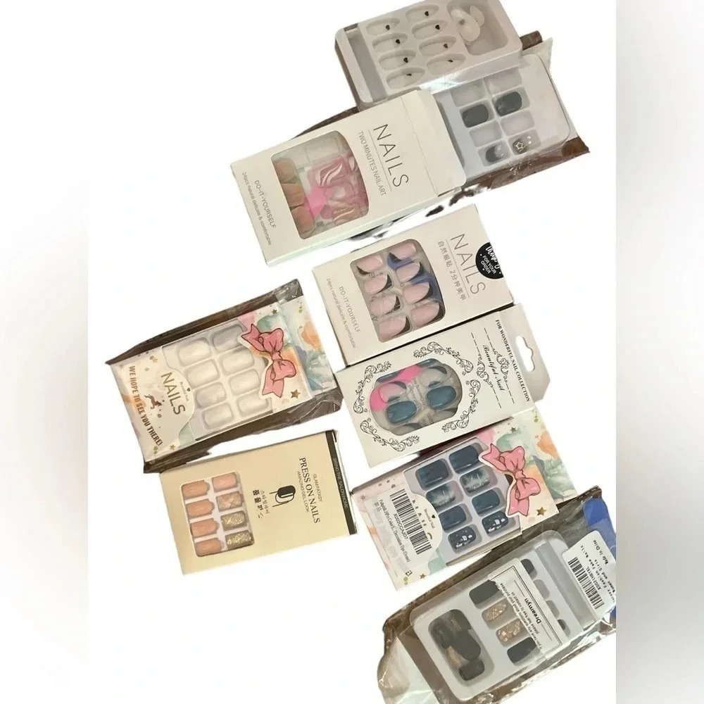Bundle of press on nails-6 new, 3 partial sets and full mani/pedi kit